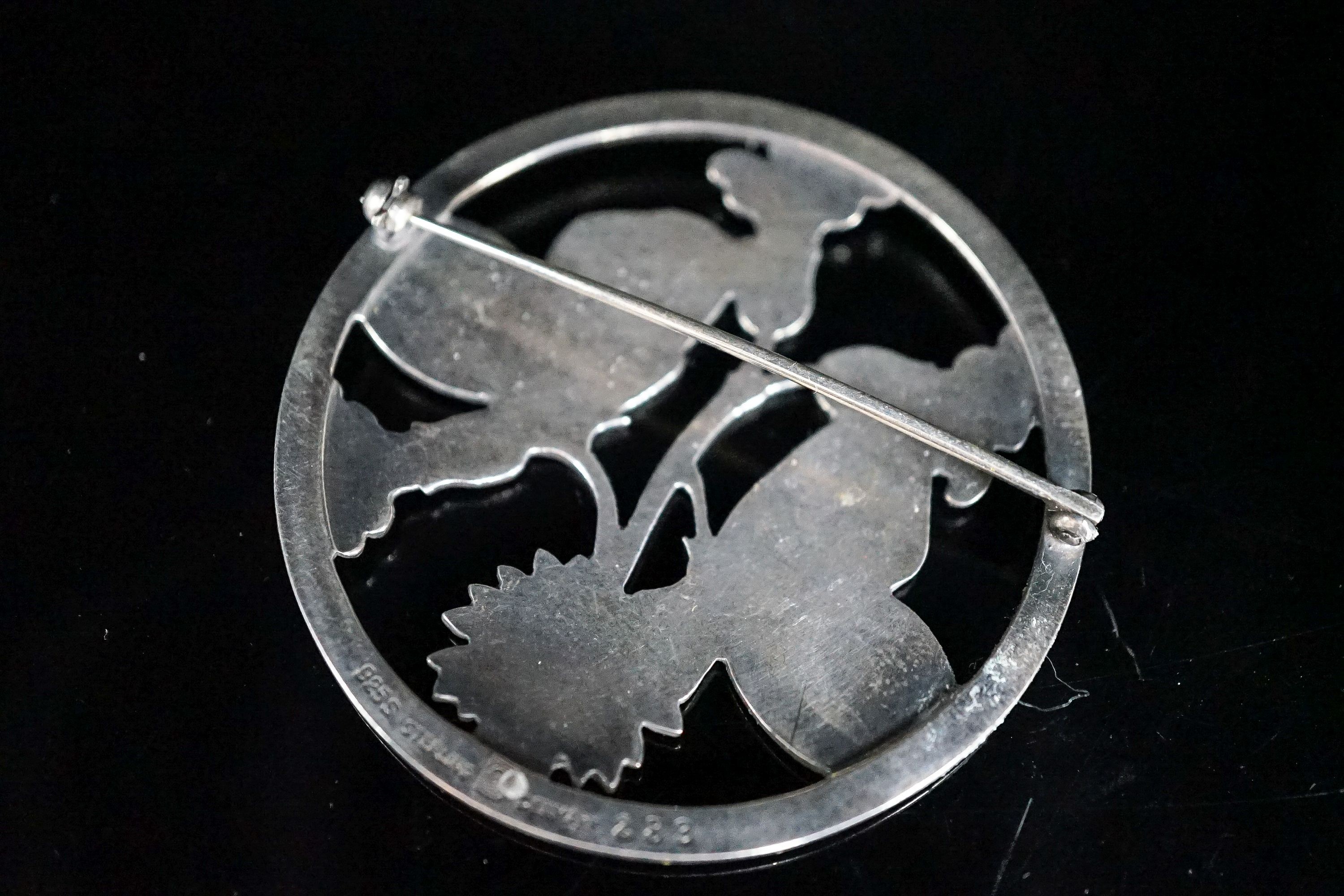 A Georg Jensen sterling circular 'Moonlit Butterfly' brooch, no. 283, 51mm.